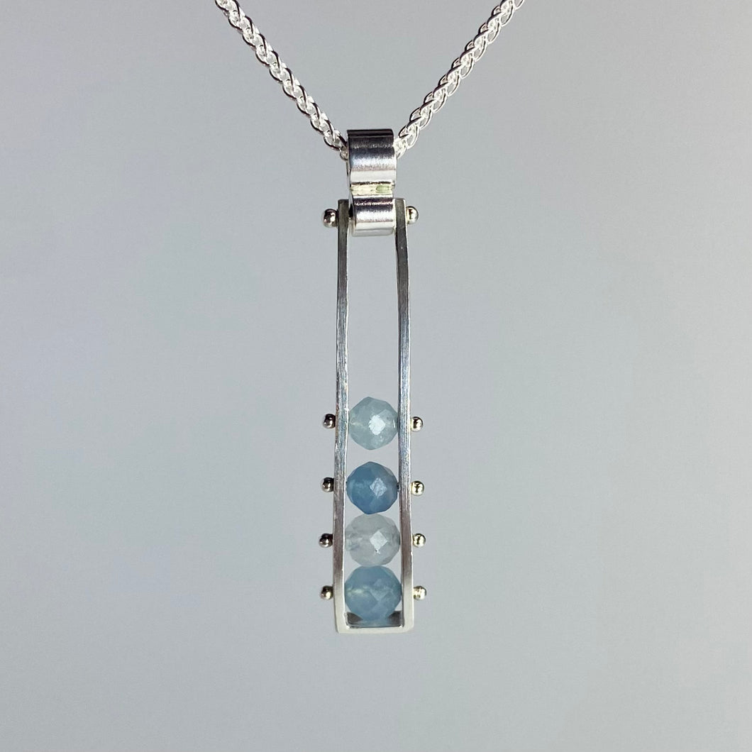 Swiveling Rectangle Necklace with Riveted Aquamarine