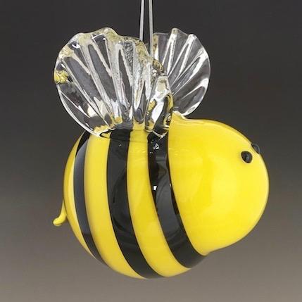 Yellow hanging blown glass bee side view